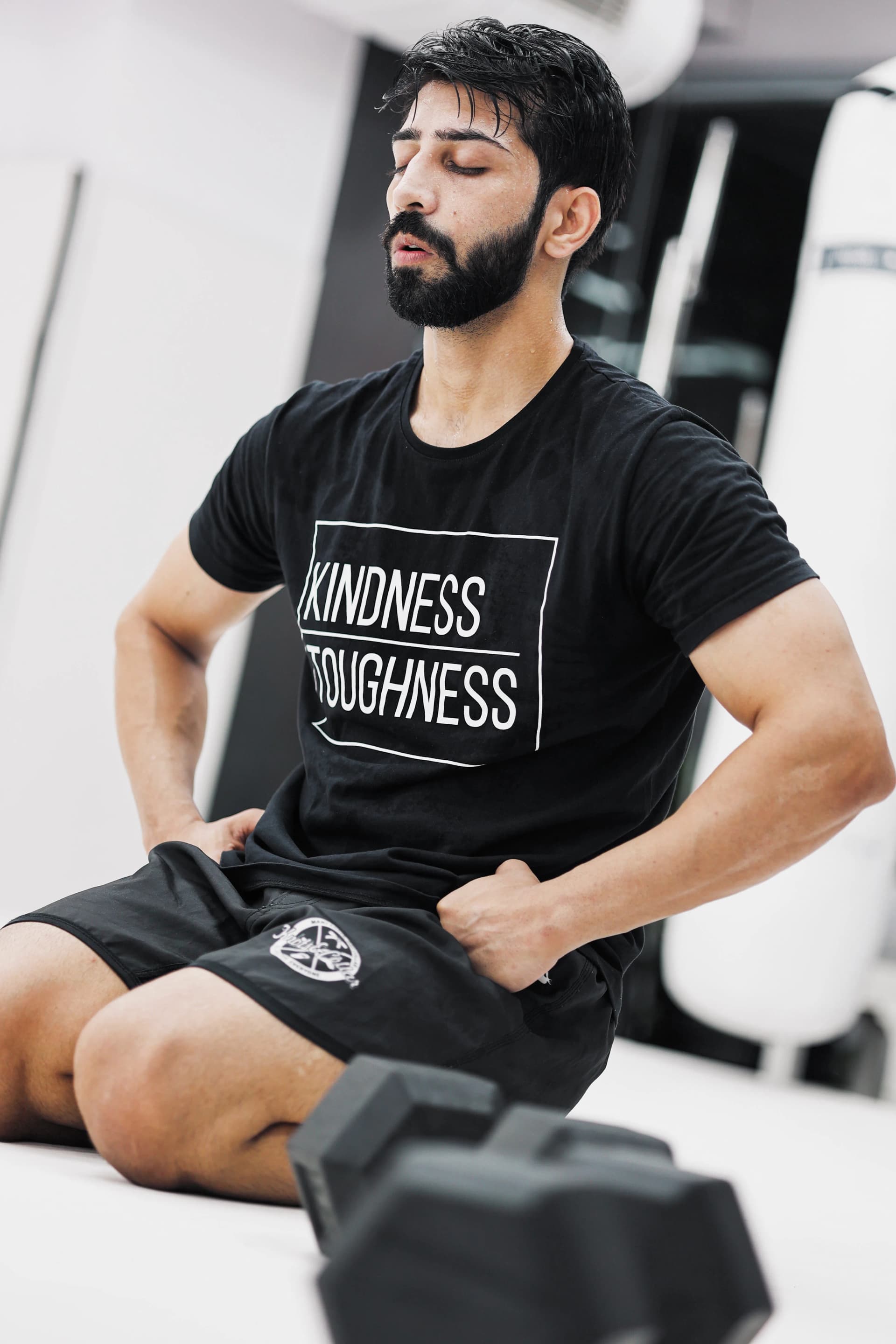 Professor Binish Sukhija seated at Knots and Collar BJJ studio Defence Colony New Delhi