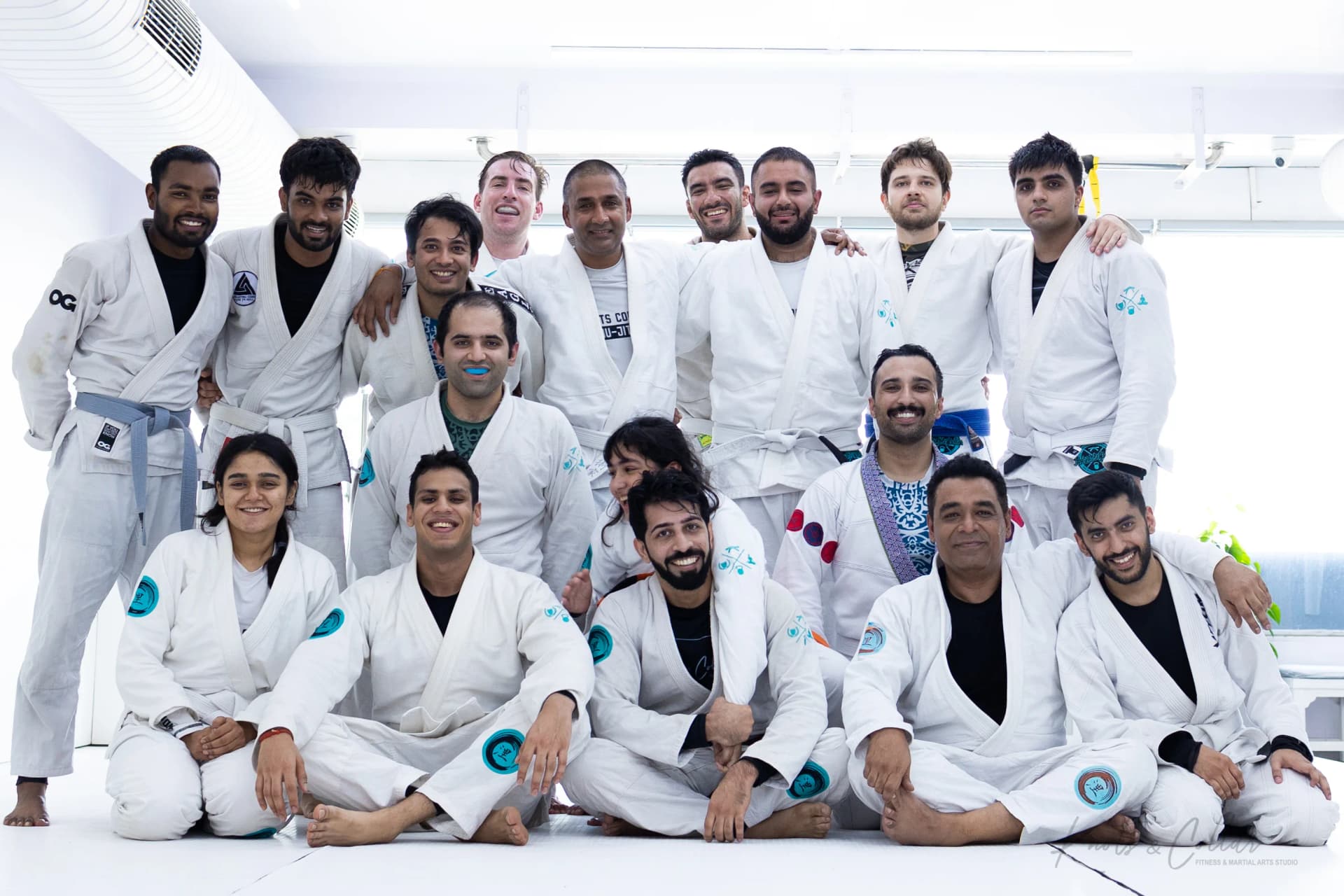 A large group of students in gi after a Brazilian Jiu-Jitsu seminar at Knots & Collar, New Delhi