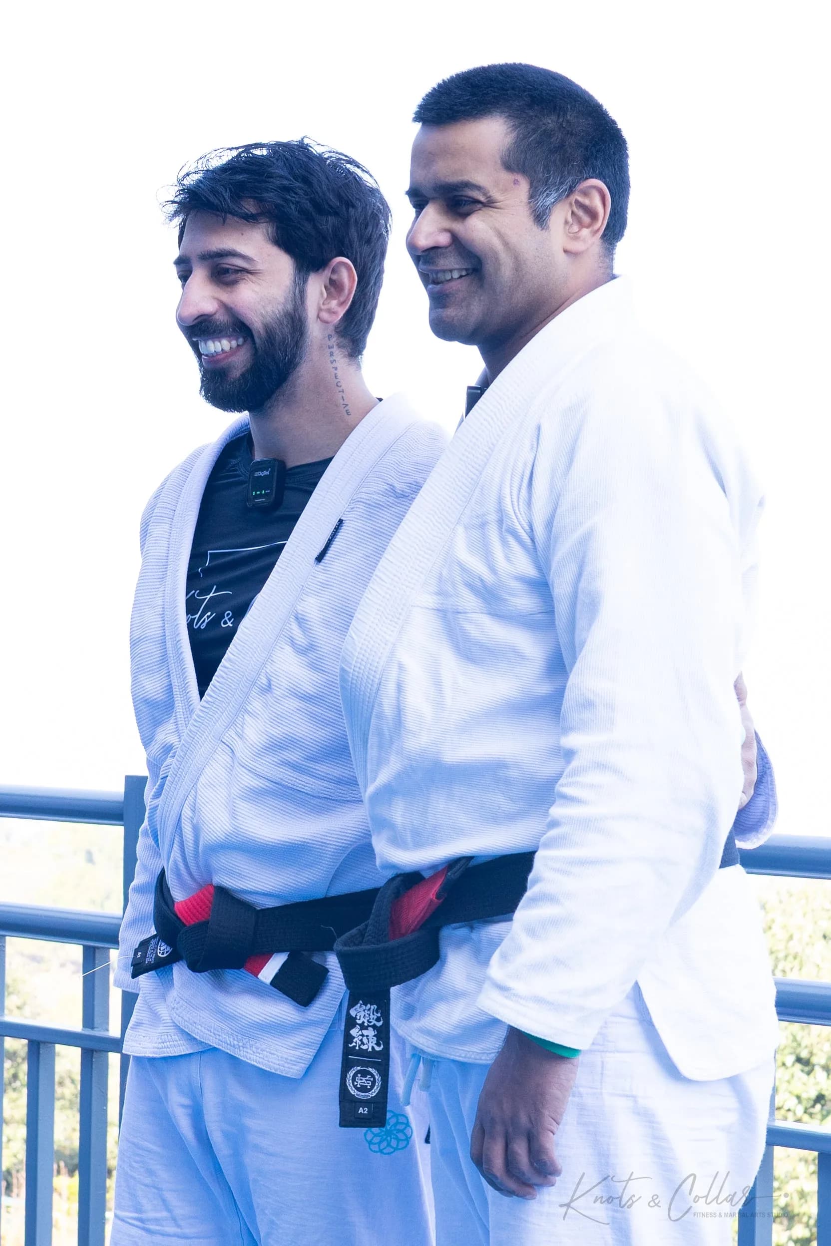 Professor Binish Sukhija receiving BJJ black belt promotion at KC Manthan retreat Mukteshwar Uttarakhand October 2025