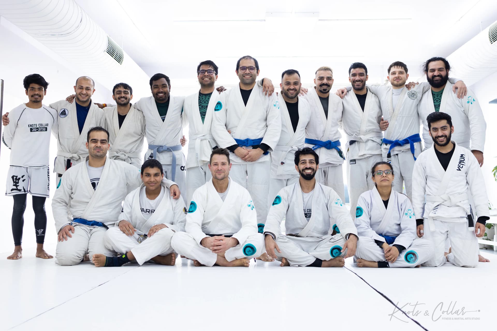 Adults and kids together after a Brazilian Jiu-Jitsu seminar at Knots & Collar in Defence Colony, New Delhi