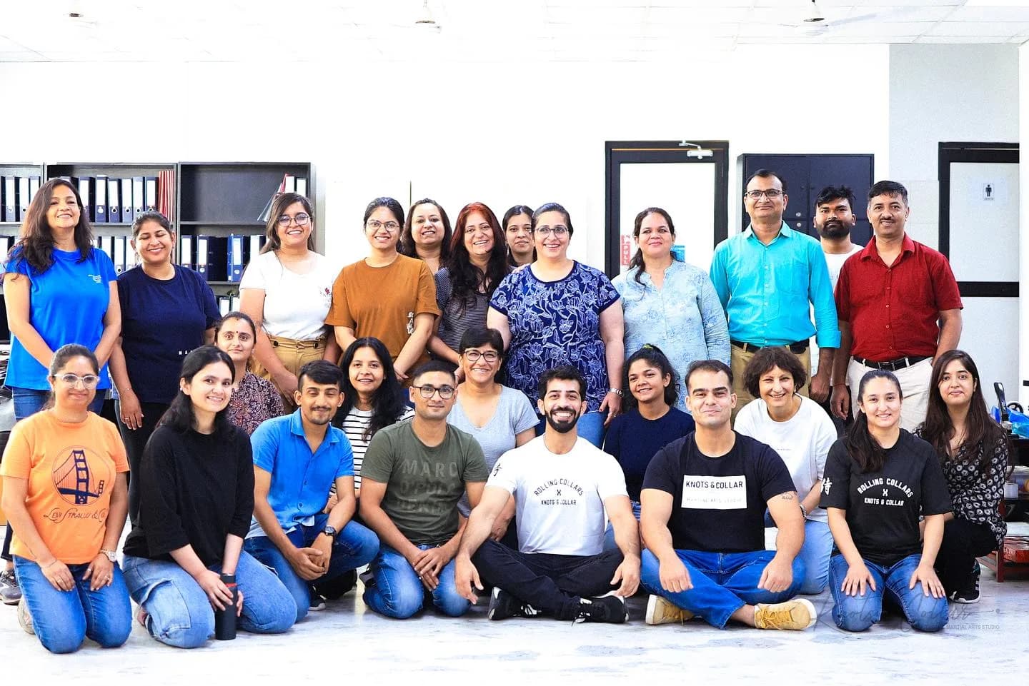 A company team with Knots & Collar coaches after a workplace martial arts and team-building session in New Delhi