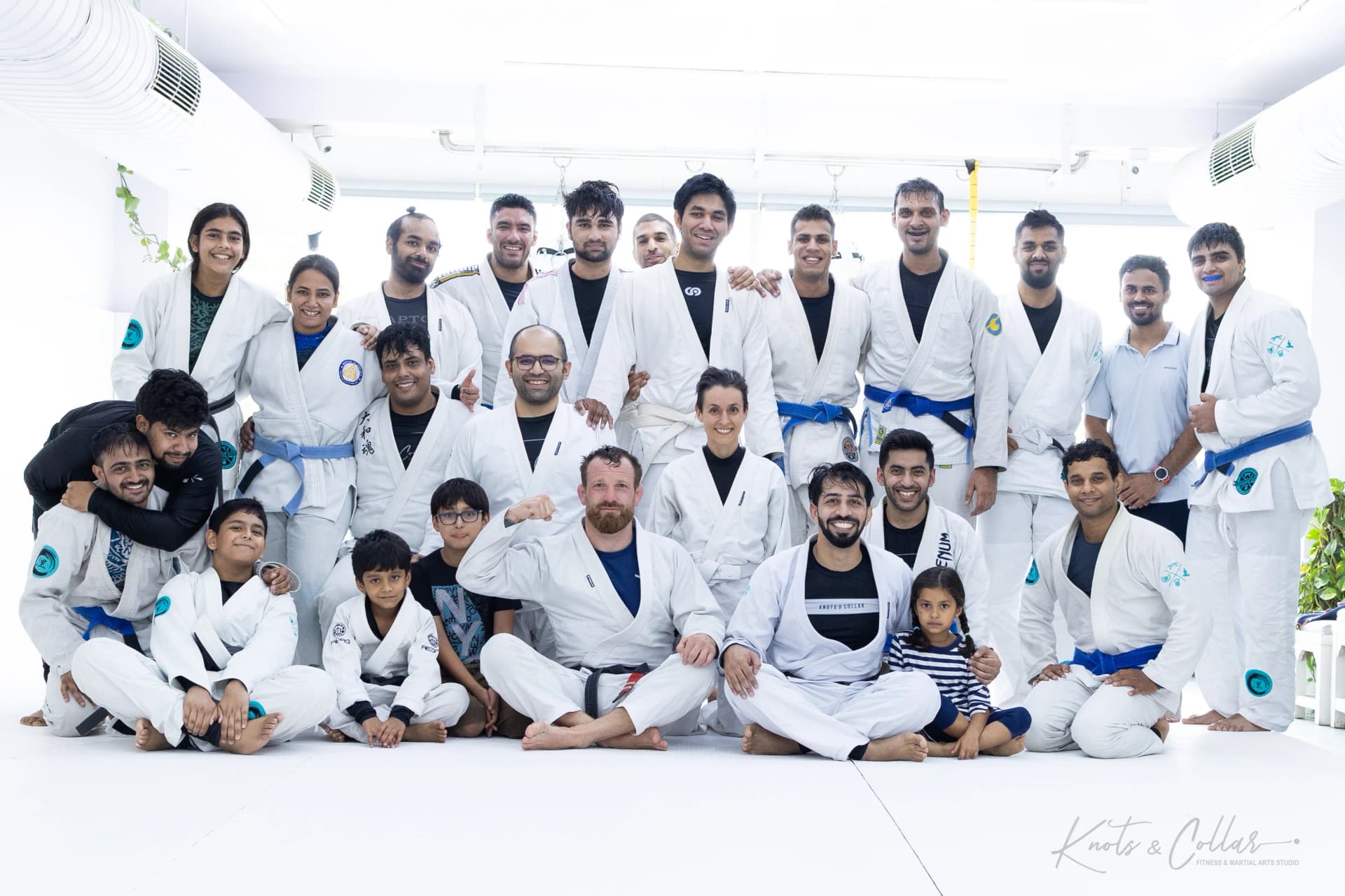 A full mat of students with a visiting black belt at a Jiu-Jitsu seminar in Defence Colony, New Delhi