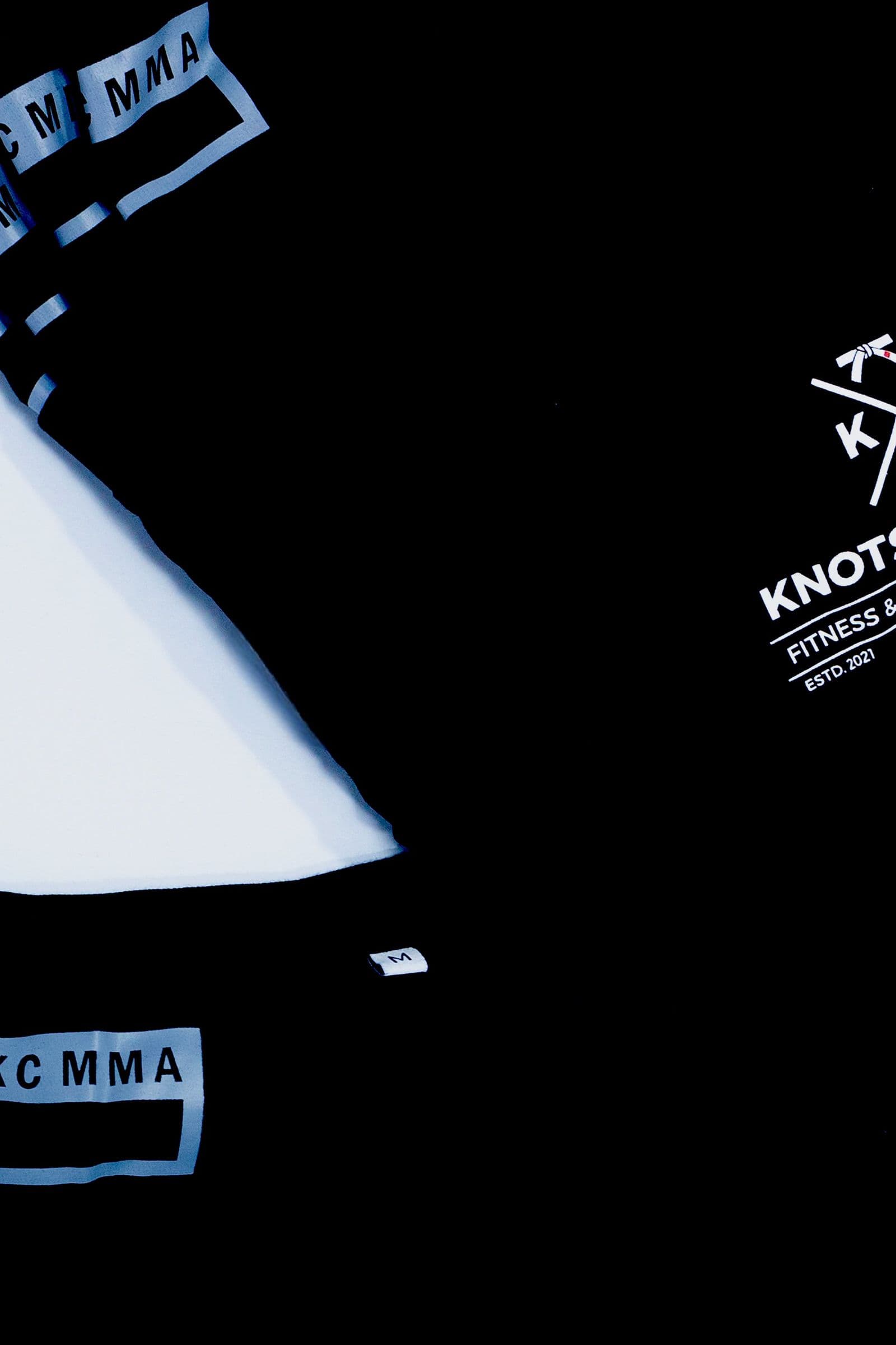 Knots & Collar branded Brazilian Jiu-Jitsu gi and apparel from the studio’s own collection
